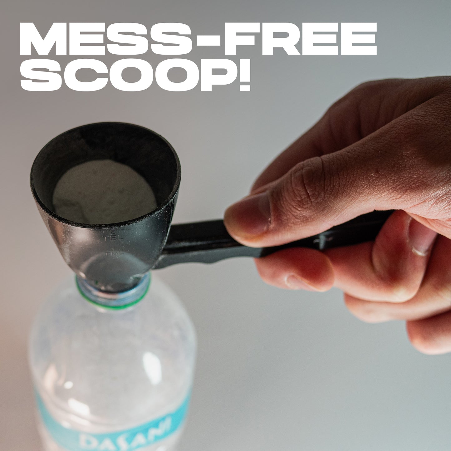 Supplement scoop comparison: Precision Pro Funnel beside a standard scoop with spilled powder.